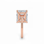 Asher  cut Moissanite lab grown diamond engagement ring round shank with a four claw setting, on a gold band, against a white background.Moissanite engagement ring cape town south africa grand diamonds ralph jacobs jeulia