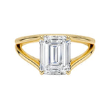 Emerald cut Moissanite lab grown diamond engagement ring round shank with a four claw setting, on a gold band, against a white background.Moissanite engagement ring cape town south africa grand diamonds ralph jacobs jeulia