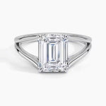 Emerald cut Moissanite lab grown diamond engagement ring round shank with a four claw setting, on a gold band, against a white background.Moissanite engagement ring cape town south africa grand diamonds ralph jacobs jeulia