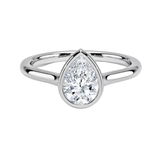 Pear shape Moissanite lab grown diamond engagement ring round shank with a bezel setting, on a gold band, against a white background.Moissanite engagement ring cape town south africa grand diamonds ralph jacobs jeulia