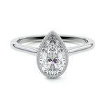 Pear shape Moissanite lab grown diamond engagement ring round shank with a bezel setting, on a gold band, against a white background.Moissanite engagement ring cape town south africa grand diamonds ralph jacobs jeulia