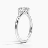 Round cut Split Shank Moissanite lab grown diamond engagement ring round shank with a six claw setting, on a gold band, against a white background.Moissanite engagement ring cape town south africa grand diamonds ralph jacobs jeuli