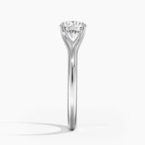 Round cut Split Shank Moissanite lab grown diamond engagement ring round shank with a six claw setting, on a gold band, against a white background.Moissanite engagement ring cape town south africa grand diamonds ralph jacobs jeuli