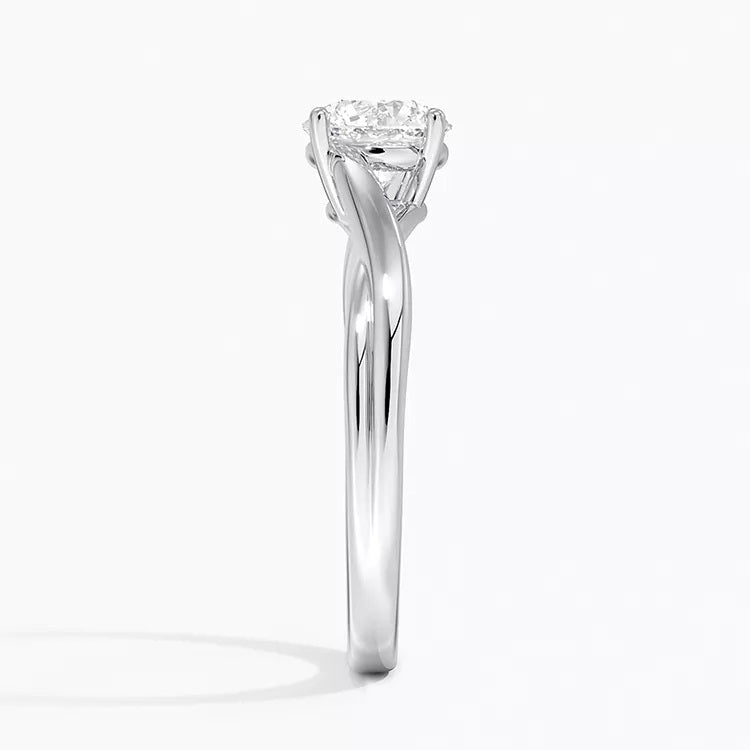 Round cut Split Shank Moissanite lab grown diamond engagement ring round shank with a six claw setting, on a gold band, against a white background.Moissanite engagement ring cape town south africa grand diamonds ralph jacobs jeuli