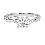 Round cut Twisted Shank Moissanite lab grown diamond engagement ring round shank with a four claw setting, on a gold band, against a white background.Moissanite engagement ring cape town south africa grand diamonds ralph jacobs jeuli