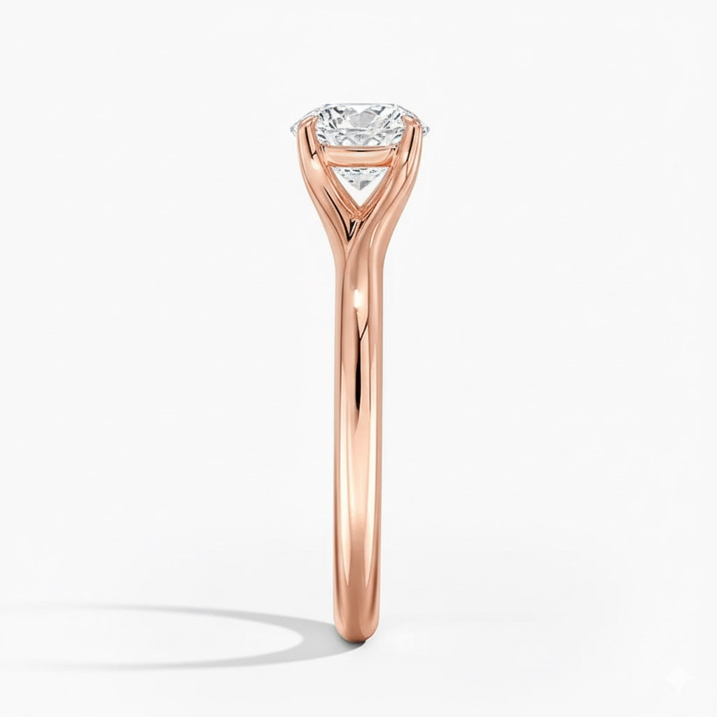 Round cut Split Shank Moissanite lab grown diamond engagement ring round shank with a six claw setting, on a gold band, against a white background.Moissanite engagement ring cape town south africa grand diamonds ralph jacobs jeuli