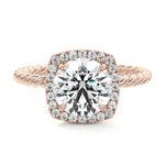 alt="Round-cut lab grown diamond engagement ring with a halo and a twisted pavé band by ApolloGem"
