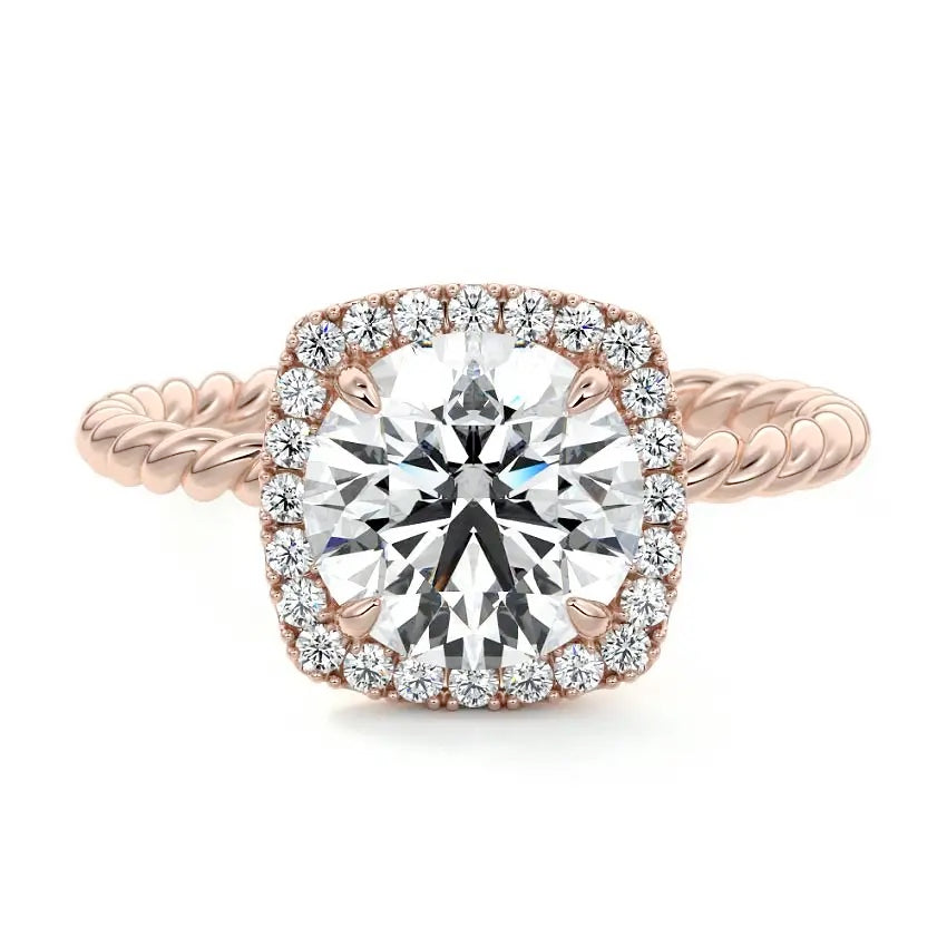 alt="Round-cut lab grown diamond engagement ring with a halo and a twisted pavé band by ApolloGem"