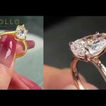 Pear cut Moissanite lab grown diamond engagement ring round shank with a six claw setting, on a gold band, against a white background.Moissanite engagement ring cape town south africa grand diamonds ralph jacobs jeuli
