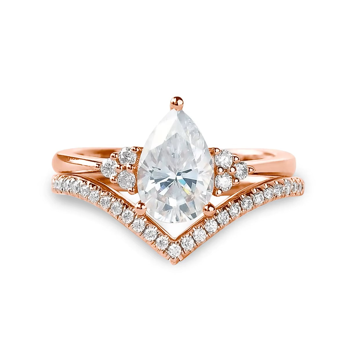 alt="Pear cut lab grown diamond engagement ring set with a matching half eternity V-shaped wedding band by ApolloGem"