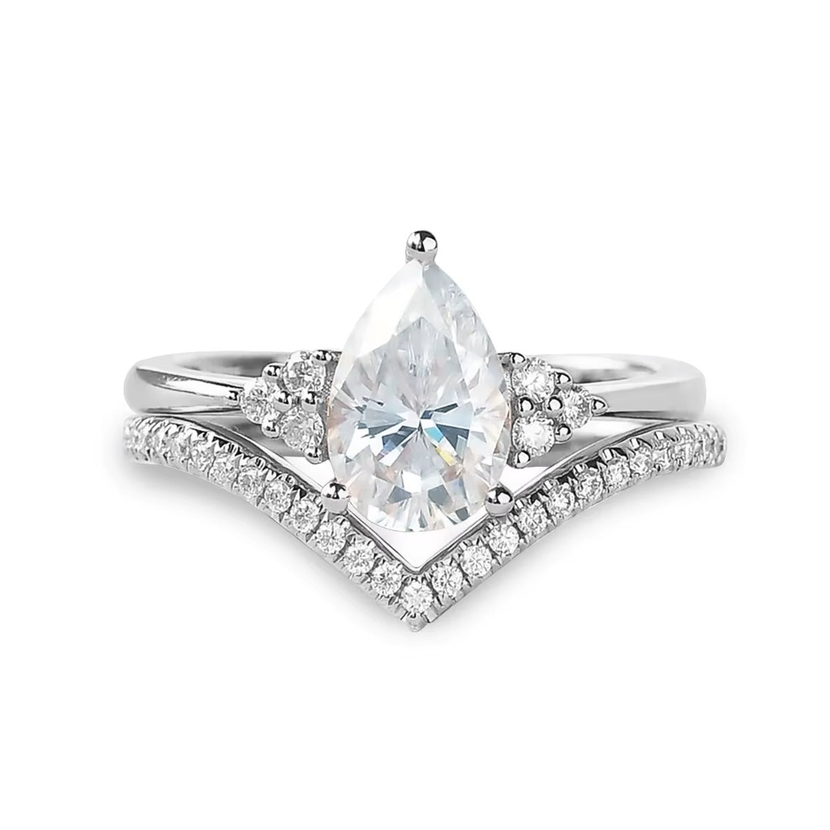 alt="Gold pear cut moissanite engagement ring set with a matching half eternity V-shaped wedding band by ApolloGem"