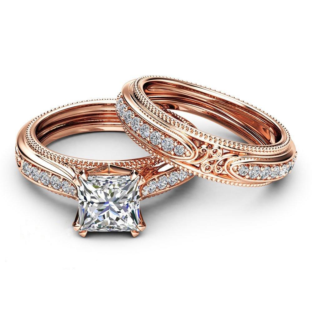 Vintage rose gold bridal set by ApolloGem Cape Town, featuring a princess cut moissanite engagement ring with intricate filigree detailing and a matching diamond pavé wedding band.