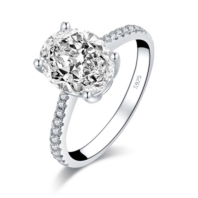 1.0ct Oval Moissanite Solitaire with Pave Small Stones in Gold