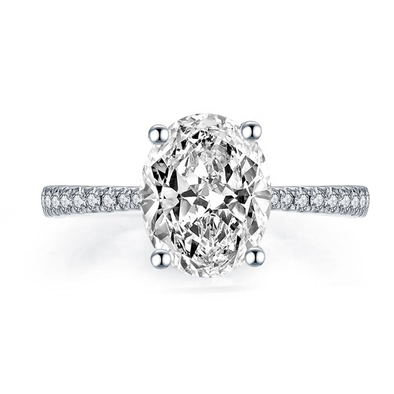 1.0ct Oval Moissanite Solitaire with Pave Small Stones in Gold