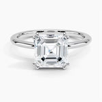 Asher cut Moissanite lab grown diamond engagement ring round shank with a four claw setting, on a gold band, against a white background.Moissanite engagement ring cape town south africa grand diamonds ralph jacobs jeulia 