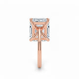 Asher  cut Moissanite lab grown diamond engagement ring round shank with a four claw setting, on a gold band, against a white background.Moissanite engagement ring cape town south africa grand diamonds ralph jacobs jeulia 