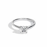 Engagement ring Cathedral setting round cut Moissanite lab grown diamond engagement ring round shank with a four claw setting, on a gold band, against a white background.Moissanite engagement ring cape town south africa grand diamonds ralph jacobs jeulia 