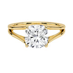 Cushion cut Moissanite lab grown diamond engagement ring V-Split shank with a four claw setting, on a gold band, against a white background.Moissanite engagement ring cape town south africa grand diamonds ralph jacobs jeulia 