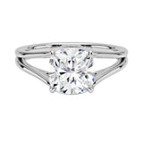 Cushion cut Moissanite lab grown diamond engagement ring V-Split shank with a four claw setting, on a gold band, against a white background.Moissanite engagement ring cape town south africa grand diamonds ralph jacobs jeulia 