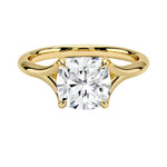 Engagement ring Cushion cut Moissanite lab grown diamond engagement ring v-Split round shank with a four cat-claw setting, on a gold band, against a white background.Moissanite engagement ring cape town south africa grand diamonds ralph jacobs jeulia 