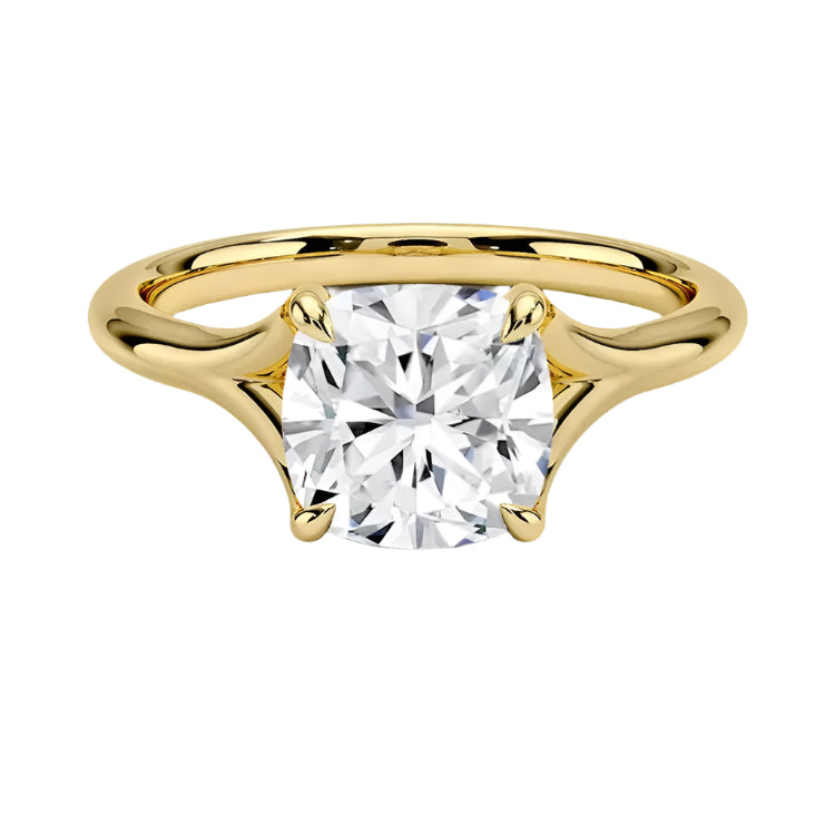 Engagement ring Cushion cut Moissanite lab grown diamond engagement ring v-Split round shank with a four cat-claw setting, on a gold band, against a white background.Moissanite engagement ring cape town south africa grand diamonds ralph jacobs jeulia 