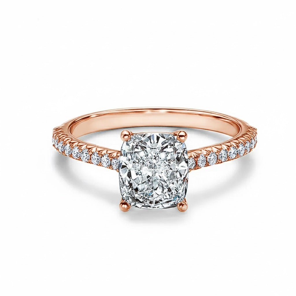 Elongated cushion cut Moissanite lab grown diamond engagement ring pave set shank with cathedral setting, on a gold band, against a white background.Moissanite engagement ring cape town south africa grand diamonds ralph jacobs jeulia 