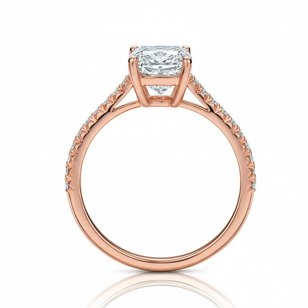 Elongated cushion cut Moissanite lab grown diamond engagement ring pave set shank with cathedral setting, on a gold band, against a white background.Moissanite engagement ring cape town south africa grand diamonds ralph jacobs jeulia 