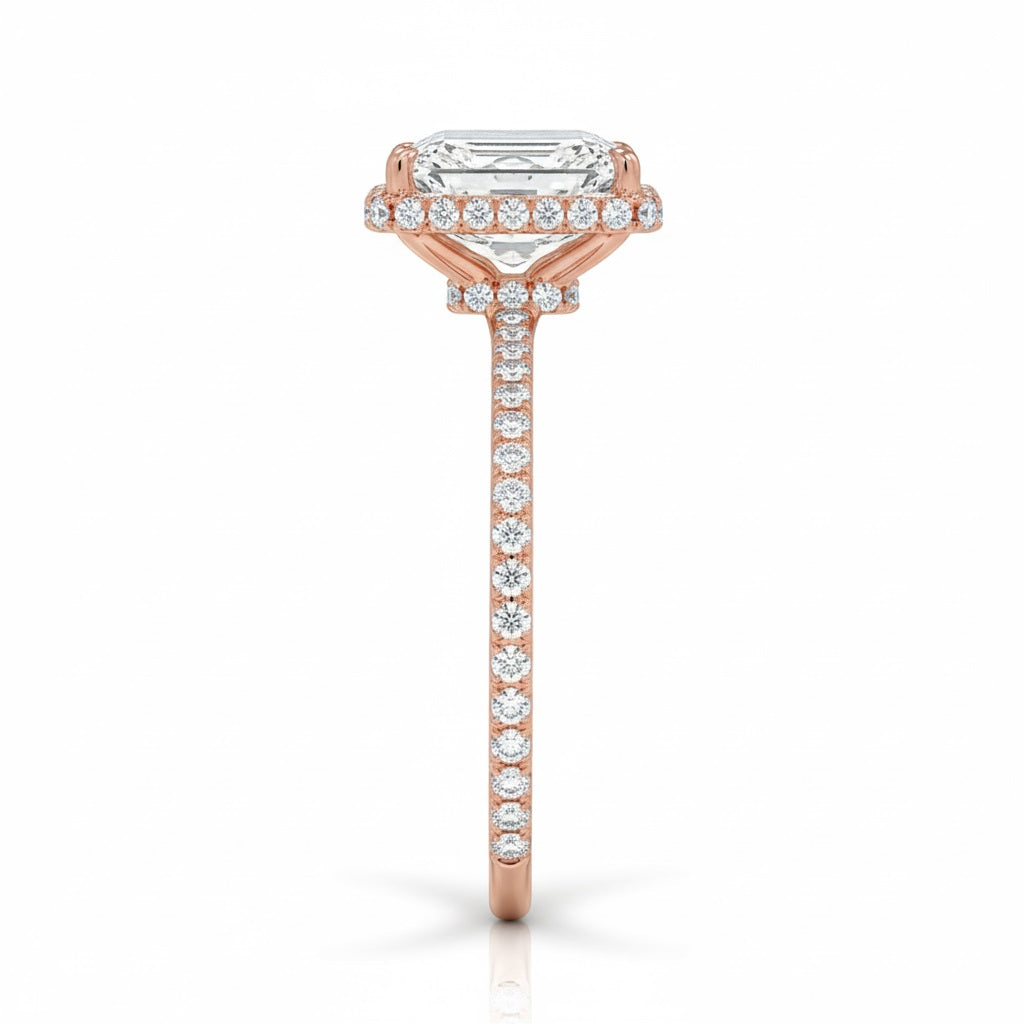 Engagement ring with emerald cut moissanite or lab grown diamond solitaire four cat claw setting yellow rose or white gold hidden double halo and pave set shank Cape Town South Africa grand diamonds ralph jacobs jeuli