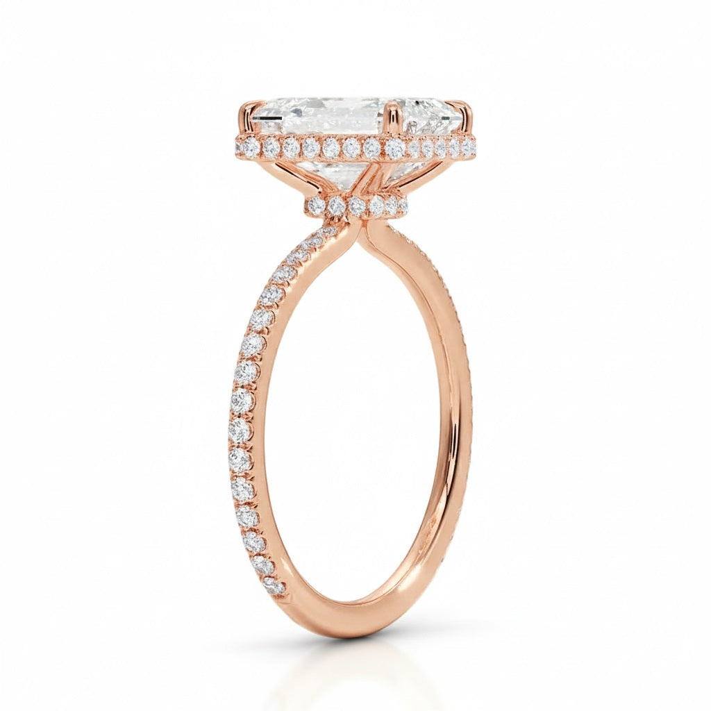 Engagement ring with emerald cut moissanite or lab grown diamond solitaire four cat claw setting yellow rose or white gold hidden double halo and pave set shank Cape Town South Africa grand diamonds ralph jacobs jeuli