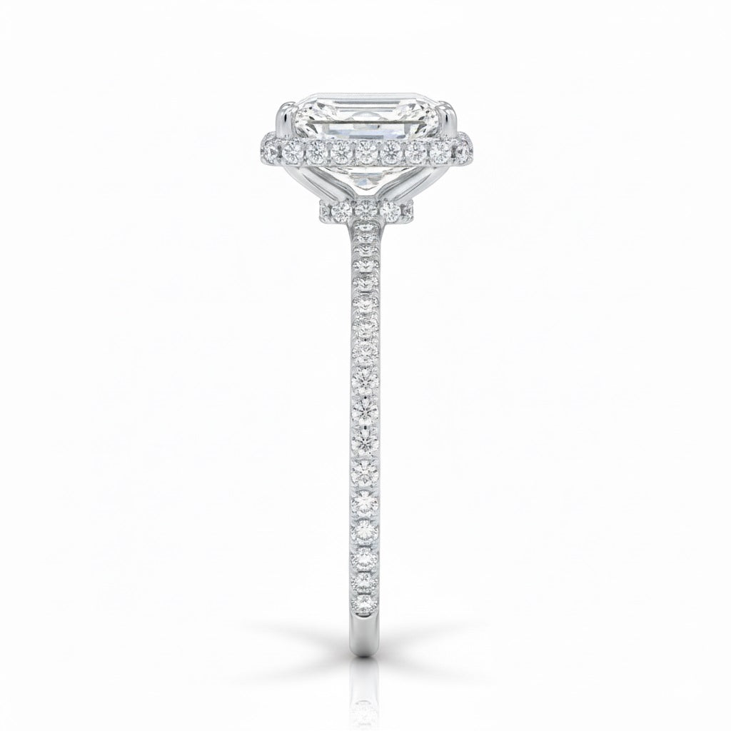 Engagement ring with emerald cut moissanite or lab grown diamond solitaire four cat claw setting yellow rose or white gold hidden double halo and pave set shank Cape Town South Africa grand diamonds ralph jacobs jeuli