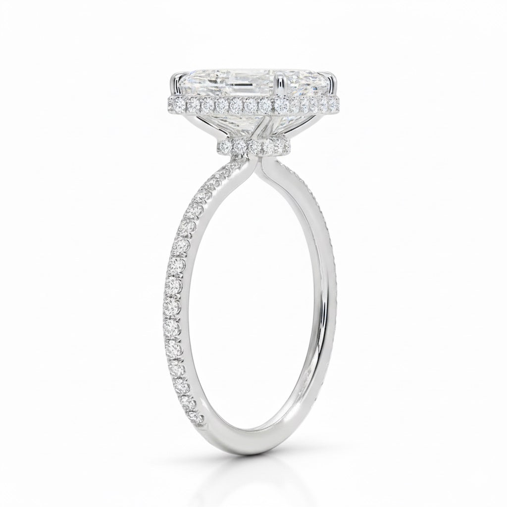 Engagement ring with emerald cut moissanite or lab grown diamond solitaire four cat claw setting yellow rose or white gold hidden double halo and pave set shank Cape Town South Africa grand diamonds ralph jacobs jeuli