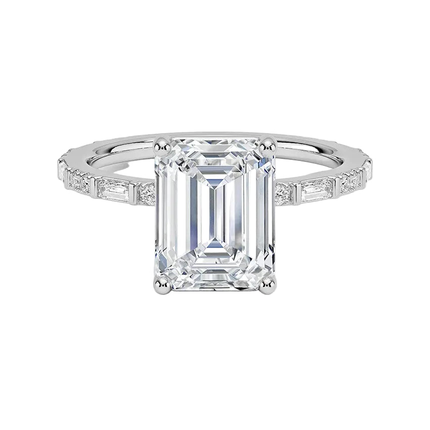 Emerald cut Moissanite lab grown diamond engagement ring with fancy baguette and round cut moissanite set pave gold band, against a white background.Moissanite engagement ring cape town south africa grand diamonds ralph jacobs jeulia 
