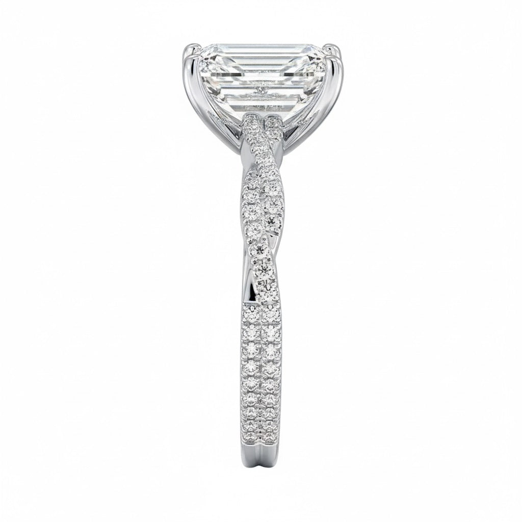 Emerald cut Moissanite lab grown diamond engagement ring with twisted pave set gold shank, against a white background.Moissanite engagement ring cape town south africa grand diamonds ralph jacobs jeulia 