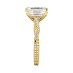 Emerald cut Moissanite lab grown diamond engagement ring with twisted pave set gold shank, against a white background.Moissanite engagement ring cape town south africa grand diamonds ralph jacobs jeulia 
