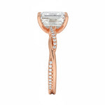 Emerald cut Moissanite lab grown diamond engagement ring with twisted single pave set gold shank, against a white background.Moissanite engagement ring cape town south africa grand diamonds ralph jacobs jeulia