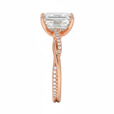 Emerald cut Moissanite lab grown diamond engagement ring with twisted single pave set gold shank, against a white background.Moissanite engagement ring cape town south africa grand diamonds ralph jacobs jeulia