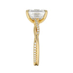 Emerald cut Moissanite lab grown diamond engagement ring with twisted single pave set gold shank, against a white background.Moissanite engagement ring cape town south africa grand diamonds ralph jacobs jeulia