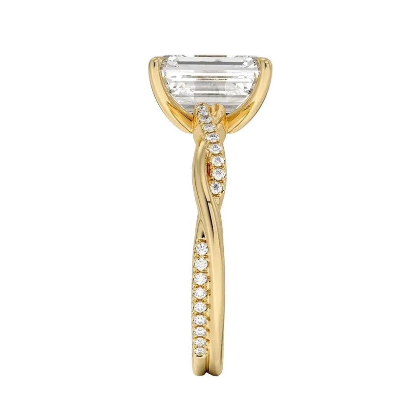 Emerald cut Moissanite lab grown diamond engagement ring with twisted single pave set gold shank, against a white background.Moissanite engagement ring cape town south africa grand diamonds ralph jacobs jeulia