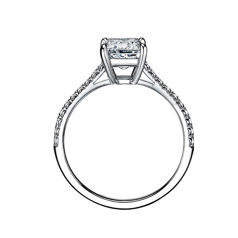 Emerald cut Moissanite lab grown diamond engagement ring pave set shank with a four claw setting, on a gold band, against a white background.Moissanite engagement ring cape town south africa grand diamonds ralph jacobs jeulia 