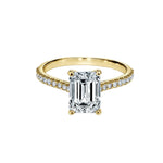 Emerald cut Moissanite lab grown diamond engagement ring pave set shank with a four claw setting, on a gold band, against a white background.Moissanite engagement ring cape town south africa grand diamonds ralph jacobs jeulia 