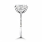 Emerald cut Moissanite lab grown diamond engagement ring with three row micro pave set gold shank, hidden halo and moissanite encrusted claws against a white background.Moissanite engagement ring cape town south africa grand diamonds ralph jacobs jeulia 