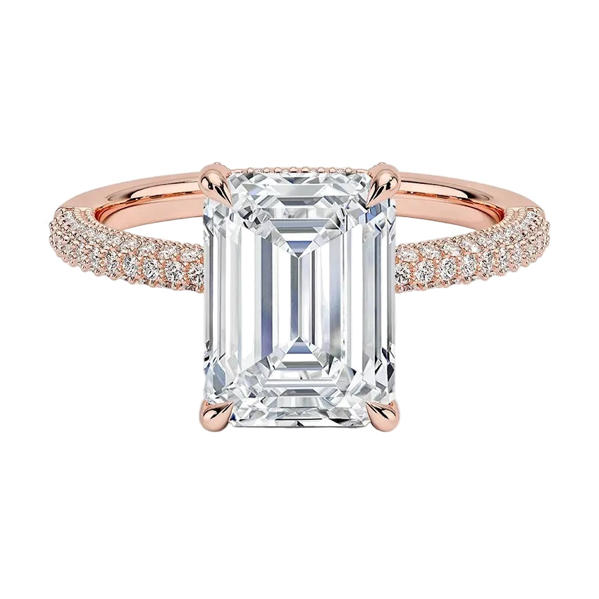 Emerald cut Moissanite lab grown diamond engagement ring with three row micro pave set gold shank, hidden halo and moissanite encrusted claws against a white background.Moissanite engagement ring cape town south africa grand diamonds ralph jacobs jeulia 