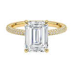 Emerald cut Moissanite lab grown diamond engagement ring with three row micro pave set gold shank, hidden halo and moissanite encrusted claws against a white background.Moissanite engagement ring cape town south africa grand diamonds ralph jacobs jeulia 