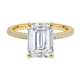 Emerald cut Moissanite lab grown diamond engagement ring with three row micro pave set gold shank, hidden halo and moissanite encrusted claws against a white background.Moissanite engagement ring cape town south africa grand diamonds ralph jacobs jeulia 