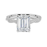 Emerald cut Moissanite lab grown diamond engagement ring with twisted pave set gold shank, against a white background.Moissanite engagement ring cape town south africa grand diamonds ralph jacobs jeulia 