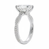 Emerald cut Moissanite lab grown diamond engagement ring with twisted pave set gold shank, against a white background.Moissanite engagement ring cape town south africa grand diamonds ralph jacobs jeulia 