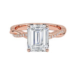Emerald cut Moissanite lab grown diamond engagement ring with twisted single pave set gold shank, against a white background.Moissanite engagement ring cape town south africa grand diamonds ralph jacobs jeulia