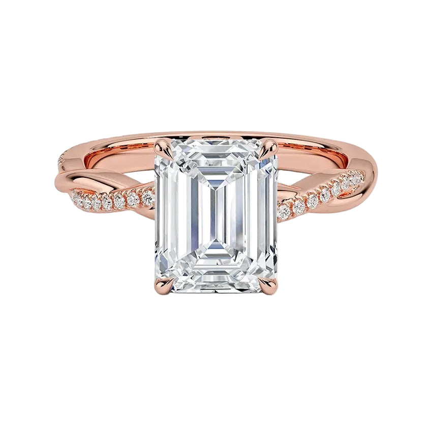 Emerald cut Moissanite lab grown diamond engagement ring with twisted single pave set gold shank, against a white background.Moissanite engagement ring cape town south africa grand diamonds ralph jacobs jeulia