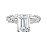 Emerald cut Moissanite lab grown diamond engagement ring with twisted single pave set gold shank, against a white background.Moissanite engagement ring cape town south africa grand diamonds ralph jacobs jeulia