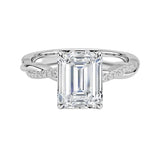 Emerald cut Moissanite lab grown diamond engagement ring with twisted single pave set gold shank, against a white background.Moissanite engagement ring cape town south africa grand diamonds ralph jacobs jeulia